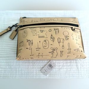 Coach X Jean-Michel Basquiat Carryall Pouch Leather Ivory Multi. Originally $350